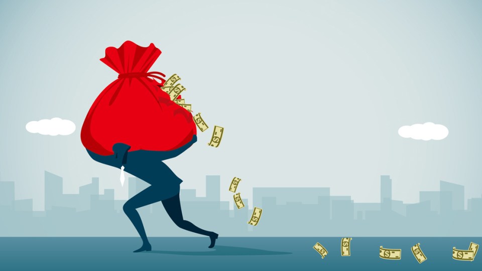 Man carries bag of cash.