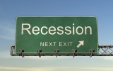 A street sign indicating an upcoming recession.