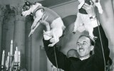 Oleg Gazenko, director of Russia’s Institute of Biomedical Problems, holds up Belka (right) and Strelka (left)