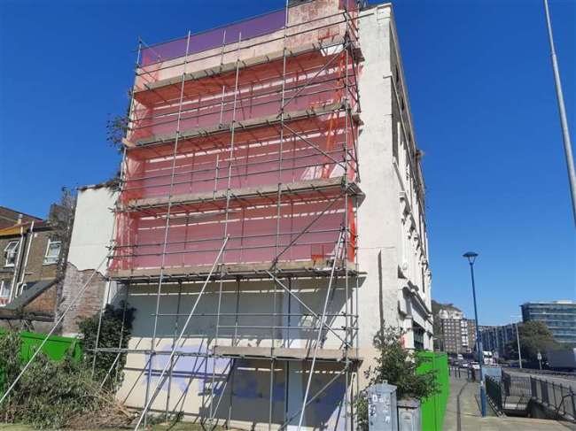 Over the weekend a four-tier scaffolding was erected beside the mural. Photo: Twitter