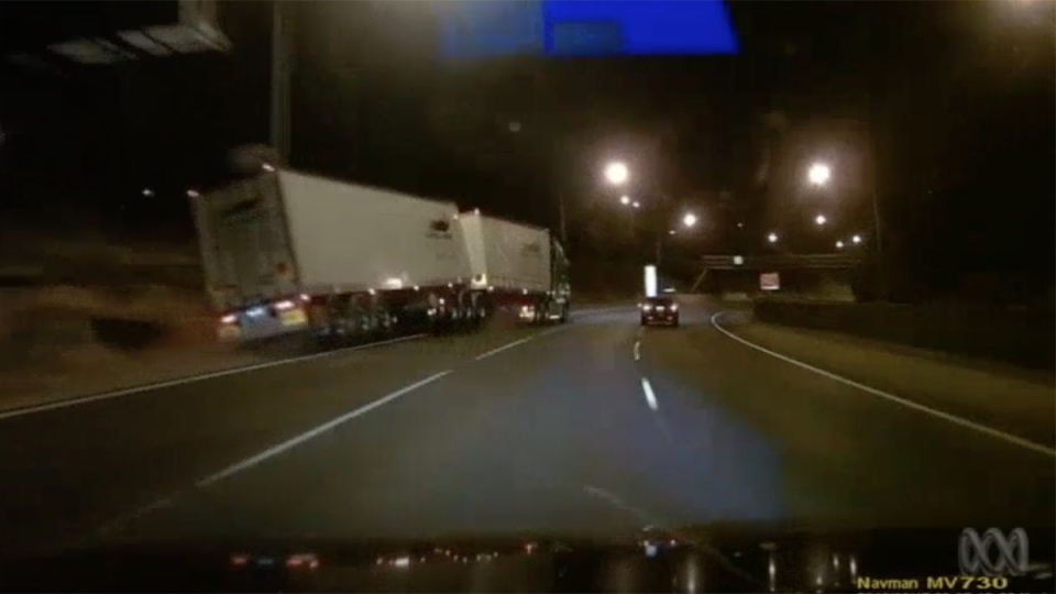 Truck about to topple.