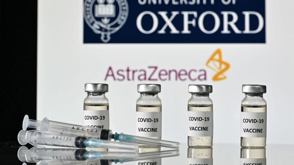 An illustration picture shows vials with Covid-19 Vaccine stickers attached and syringes, with the logo of the University of Oxford and its partner British pharmaceutical company AstraZeneca, on November 17, 2020. (Photo by JUSTIN TALLIS / AFP) (Photo by JUSTIN TALLIS/AFP via Getty Images)