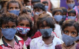 Pictures of children from Chennai, India wearing mask against covid-19 second wave in India. World vision India is helping communities to fight against Covid by providing Masks and sanitizers