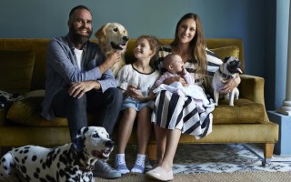 Family sitting on sofa