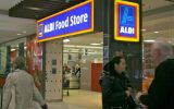 Aldi woman sue