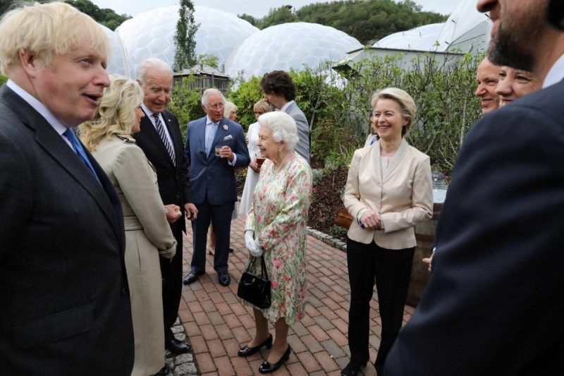 Queen Elizabeth speaking with President Biden and the first lady, Jill Biden, during Friday’s gathering of world leaders.