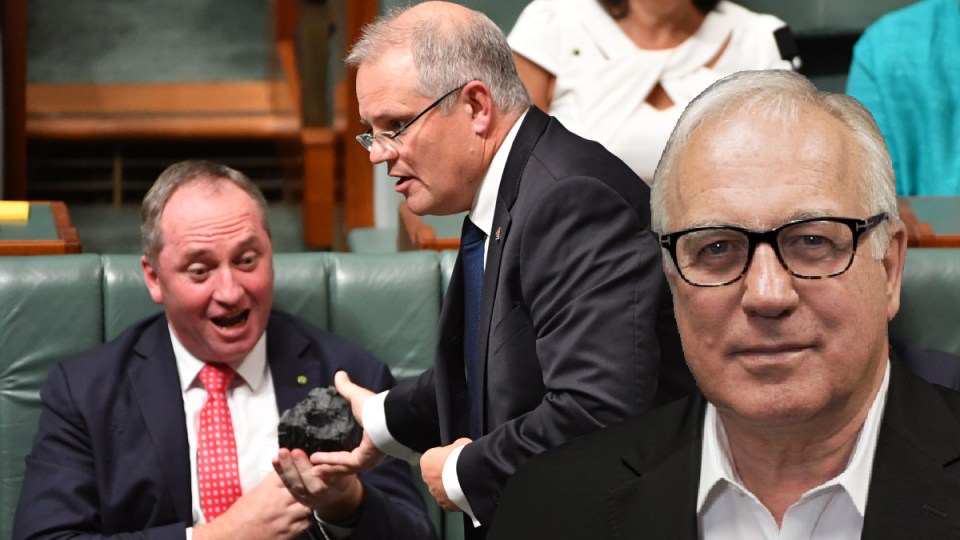 Treasurer Scott Morrison hands Deputy Prime Minister Barnaby Joyce a lump of coal during Question Time in the House of Representatives at Parliament House in Canberra, Thursday, Feb. 9, 2017