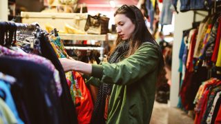 Woman shopping in London second hand marketplace