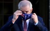 Prime Minister Scott Morrison is seen wearing a face mask during a press conference at Kirribilli House on July 16, 2021 in Sydney