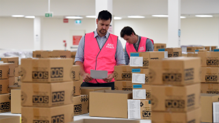 election Evan Ekin-Smyth from the AEC inspects voting materials at a warehouse in Queanbeyan, near Canberra.