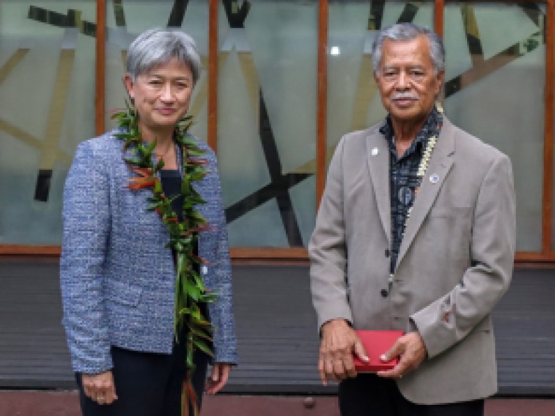 Penny Wong, pictured here with Pacific Island Forum Secretary-General Henry Puna in May, wasted no time visiting Australia's Pacific neighbours.