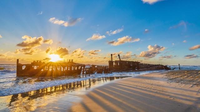 A Fraser Island shipwreck at sunset.