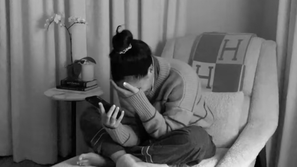A distressed Meghan Markle in a clip from the new promo. Photo: Netflix
