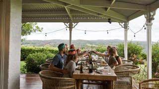 Pictured is a family having Christmas lunch