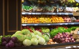 pictured are the produce aisle at the supermarket, illustrating food waste.