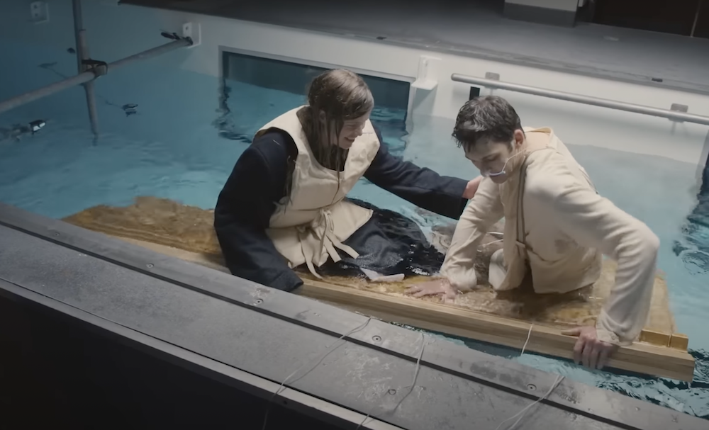 Pictured are the stunt people acting out the scene from Titanic