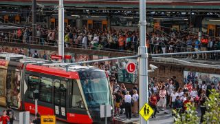 Commuters mill about at Central Station on March 08, 2023 in Sydney, while Sydney trains were down.
