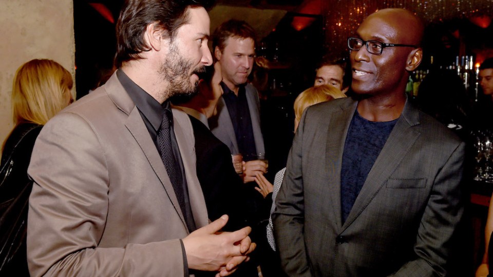 Pictured is Lance Reddick and Keanu Reeves