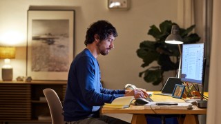 Pictured is someone working from home. After work intrusions are harming employee's mental health.