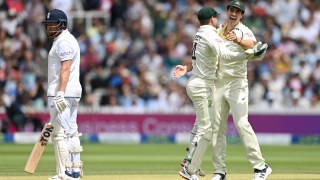 Pat Cummins of Australia and Alex Carey of Australia celebrates the wicket of Jonny Bairstow of England during Day Five of the LV= Insurance Ashes 2nd Test match between England and Australia at Lord's Cricket Ground on July 02, 2023 in London, England.