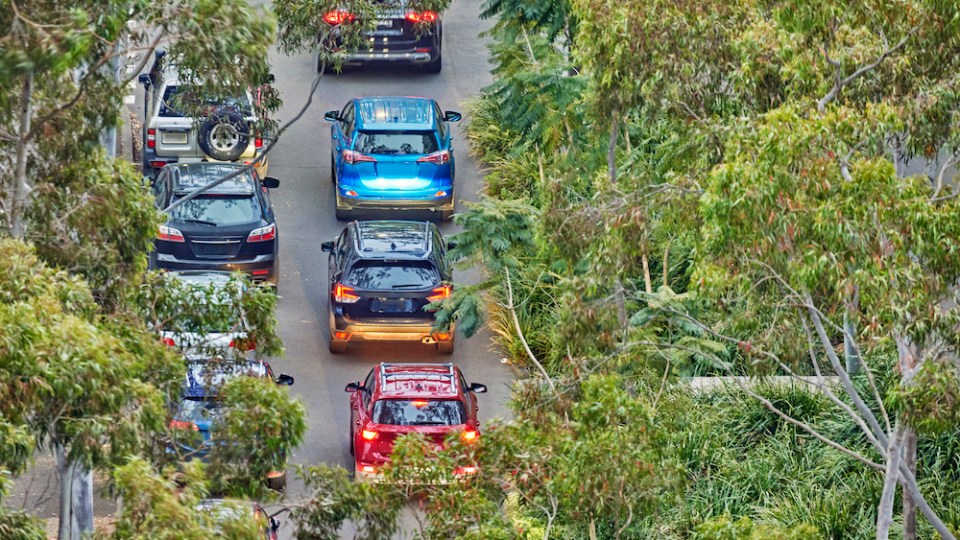 pictured are cars on the road