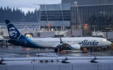 An Alaska Airlines Boeing 737 MAX 9 plane sits at a gate at Seattle-Tacoma International Airport on January 6, 2024 in Seattle, Washington. Alaska Airlines grounded its 737 MAX 9 planes after part of a fuselage blew off during a flight from Portland Oregon to Ontario, California.