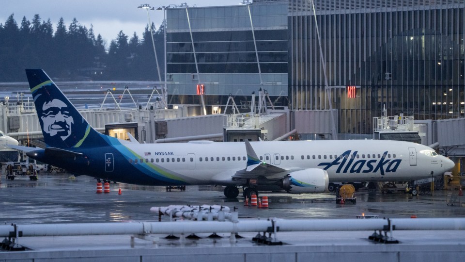 An Alaska Airlines Boeing 737 MAX 9 plane sits at a gate at Seattle-Tacoma International Airport on January 6, 2024 in Seattle, Washington. Alaska Airlines grounded its 737 MAX 9 planes after part of a fuselage blew off during a flight from Portland Oregon to Ontario, California.