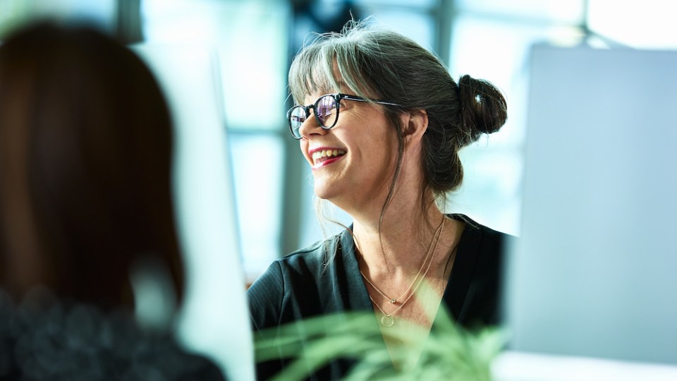 pictured is a woman in the workplace