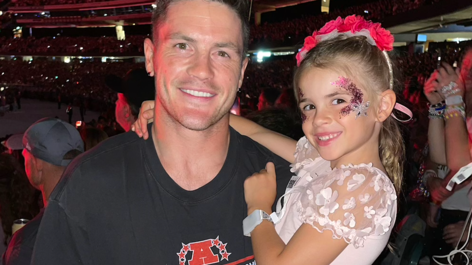 Pictured is Collingwood star and Swiftie dad Jack Crisp and his daughter Lilah