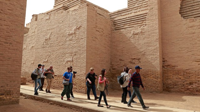 Foreign tourists in the ancient city of Babylon, about 100 kilometres south of the Iraq capital, Baghdad.